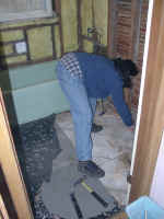 Bernadette pulling up the original linoleum floor (1285923 bytes)