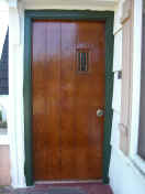 Front door with dark green trim color (177429 bytes)